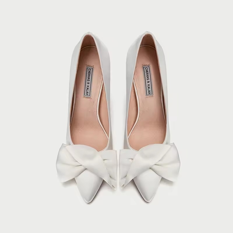 white heels with bows