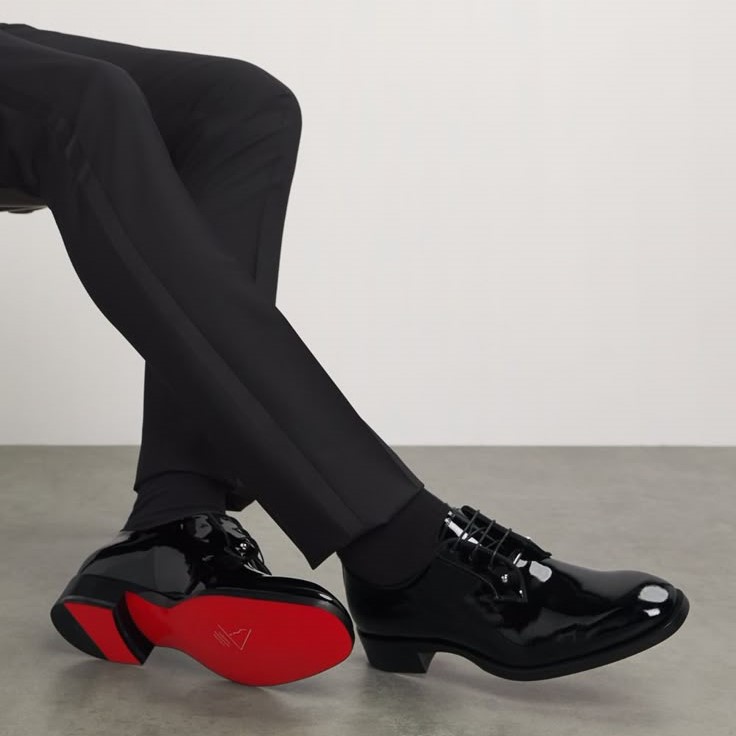 who makes red bottom shoes