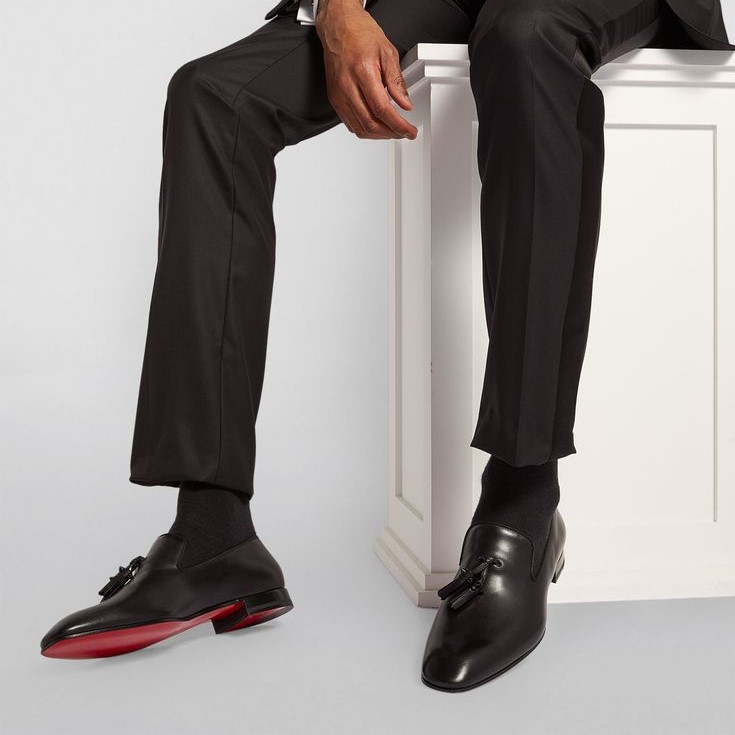 who makes red bottom shoes